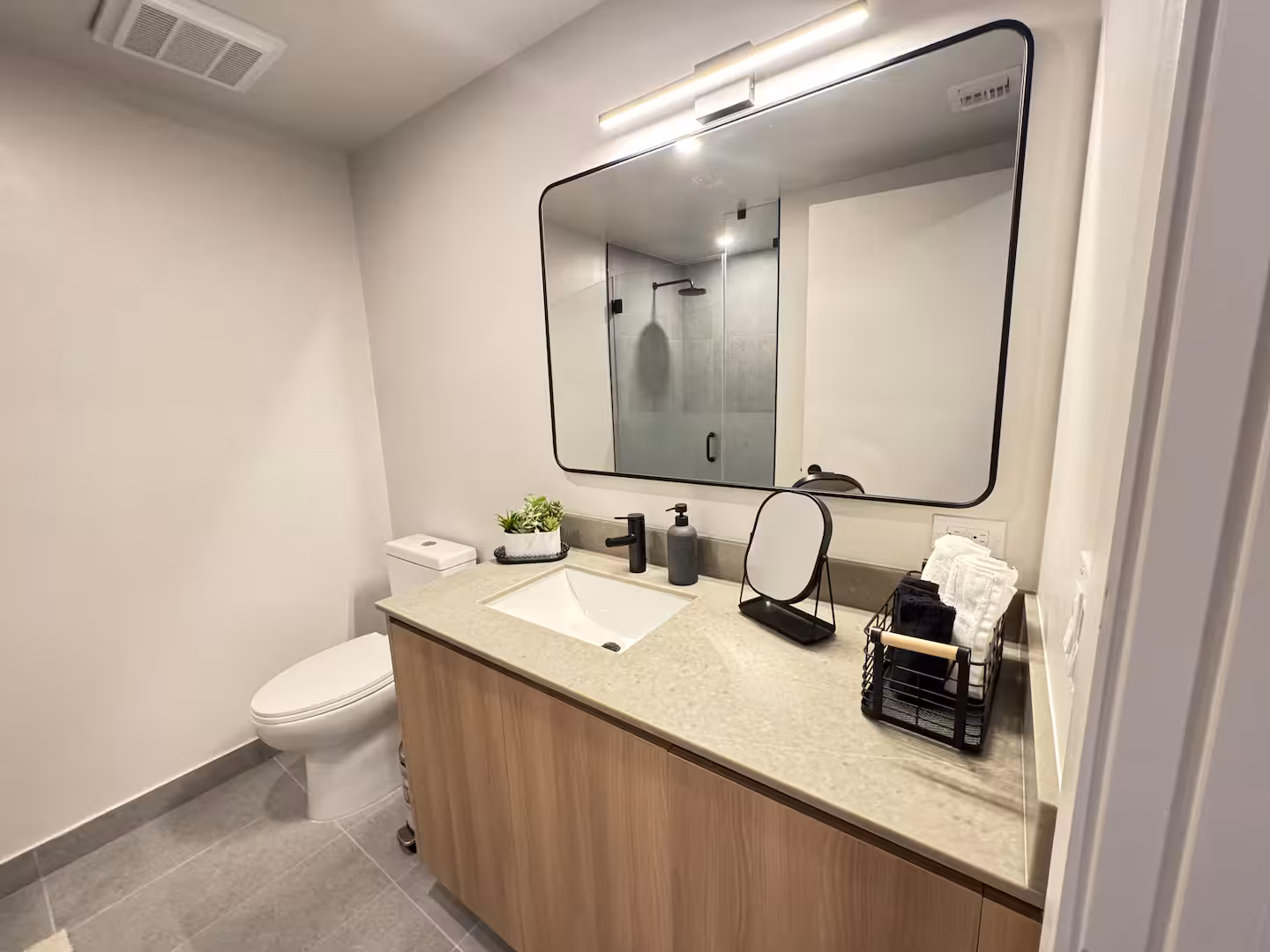 501 First bathroom with clean finishes.